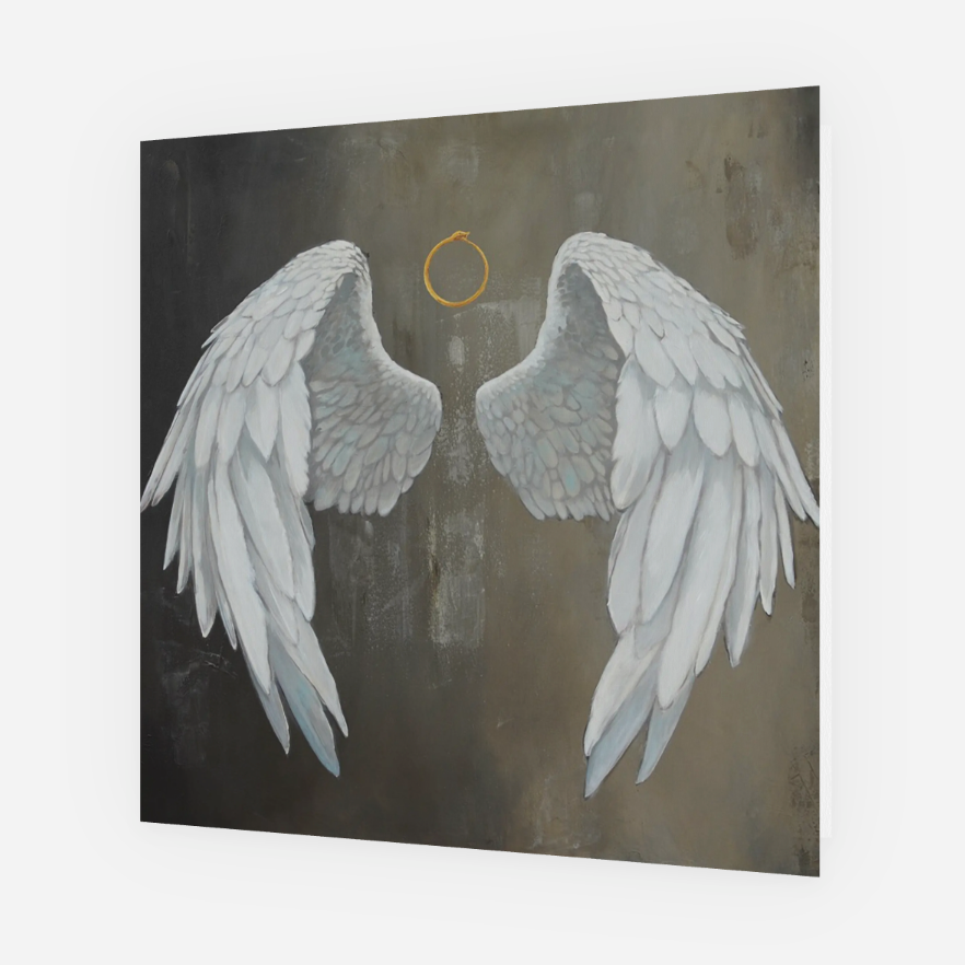 Decorative wall art with angel wings and a halo on a dark background